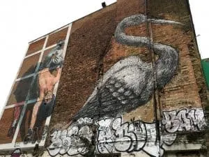 Street art crane mural by Roa in Brick Lane, London's East End