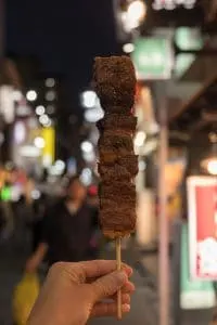 The Best Japanese Street Food in Tokyo's Shibuya Neighborhood | A Tokyo Food Tour with Arigato Food Tours | Snacking on Kobe Beef Skewers