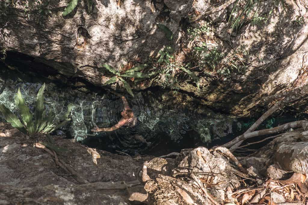 Swimming in Cenote Jardin del Eden near Tulum Mexico