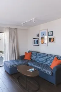 Living room in bright and airy bungalow at the Paradise Point Resort & Spa in San Diego, California
