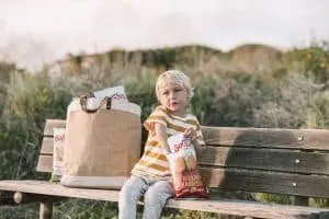 Child eating Boulder Canyon Potato Chips