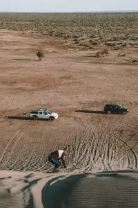 Sandboarding down the sand dunes in El Mogote