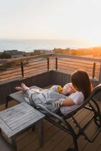 Watching sunset from the balcony of our Vacasa vacation home in Sea Ranch, California