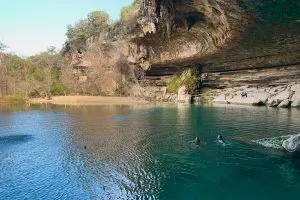 Swimming at Hamilton Pool preserve near Austin, Texas