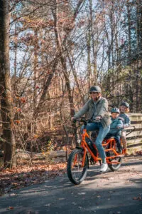 Family riding RadWagon 4 Electric Cargo Bike